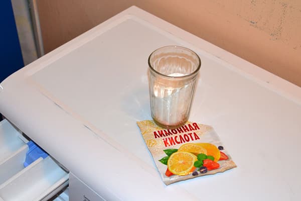 Acid citric pentru o mașină de spălat